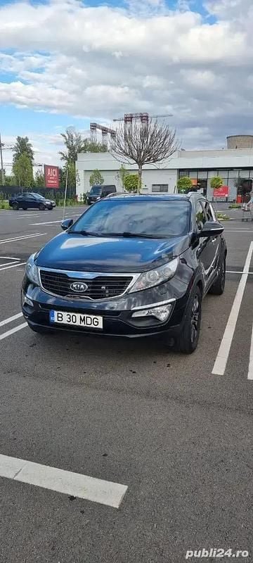 Negru Utilizat 2013 Kia Sportage SUV | 8.800 EUR (Preț OK) - Imagine 1/4