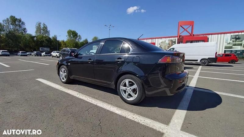 Culoarenegru Utilizat 2012 Mitsubishi Lancer Berlinǎ | 4.290 EUR - Imagine 1/4