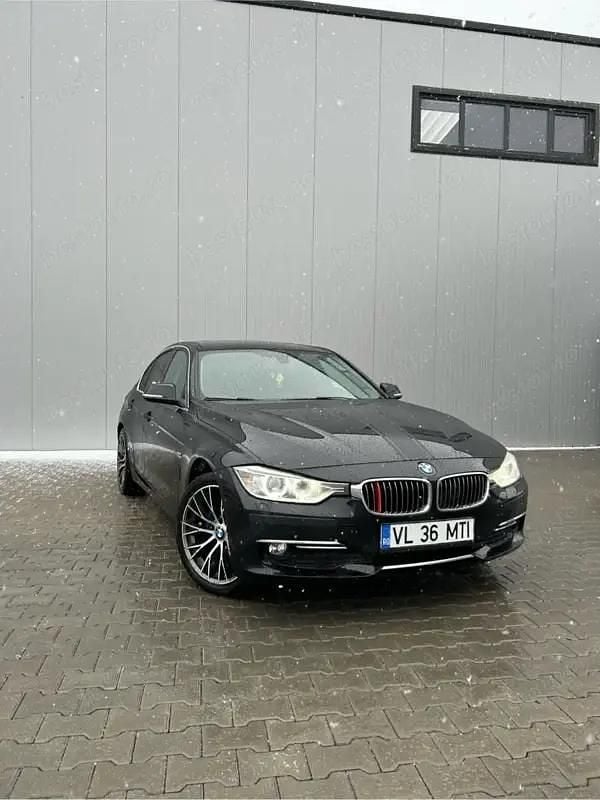 Second-hand BMW 320 184 CP (135 kW) 2012 Negru Berlinǎ