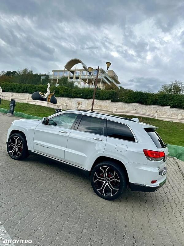 Second-hand Jeep Grand Cherokee Summit 250 CP (183 kW) 2014 Culoarealb SUV
