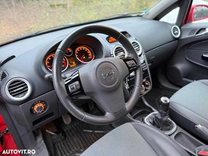 Second-hand Opel Corsa Edition 90 CP (66 kW) 2009 Culoarerosu Hatchback