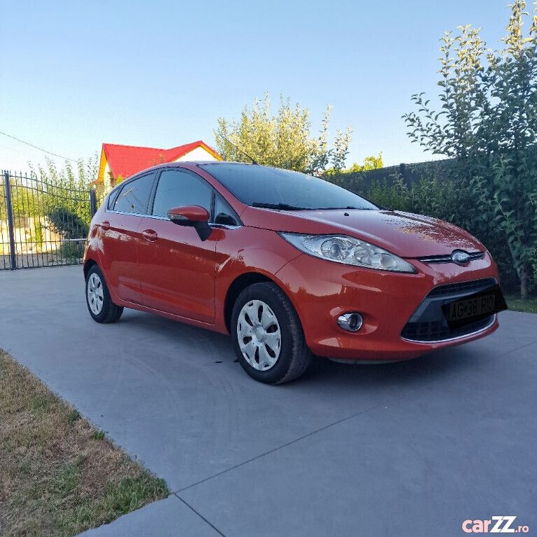 Portocaliu Utilizat 2011 Ford Fiesta Trend Hatchback | 3.690 EUR (Preț bun) - Imagine 1/4