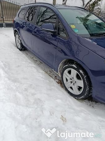 Second-hand Opel Astra 110 CP (80 kW) 2011 Albastru Break