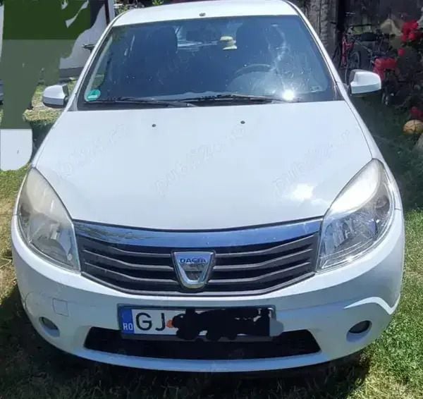 Utilizat 2012 Dacia Sandero Hatchback | 1.999 EUR - Imagine 1/4