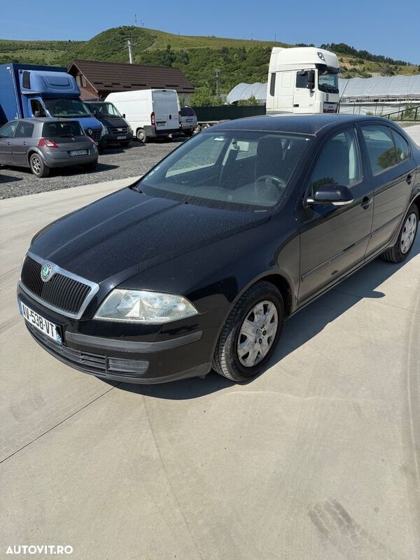 Negru Utilizat 2006 Skoda Octavia Ambiente Berlinǎ | 2.400 EUR (Preț OK) - Imagine 1/4