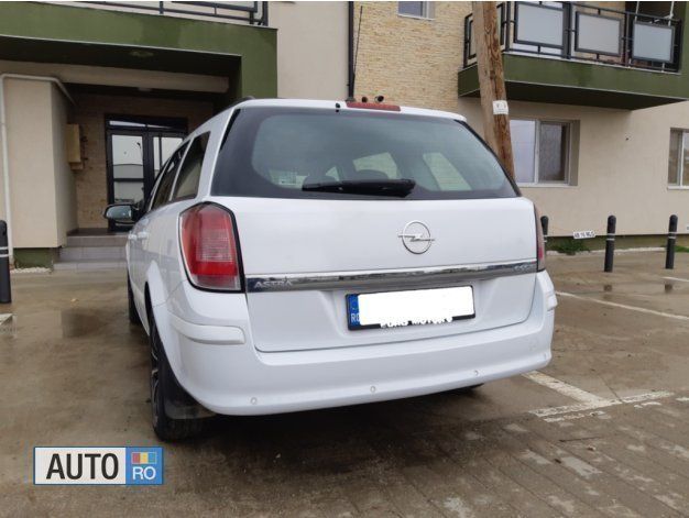 Second-hand Opel Astra 110 CP (80 kW) 2009 Alb Break