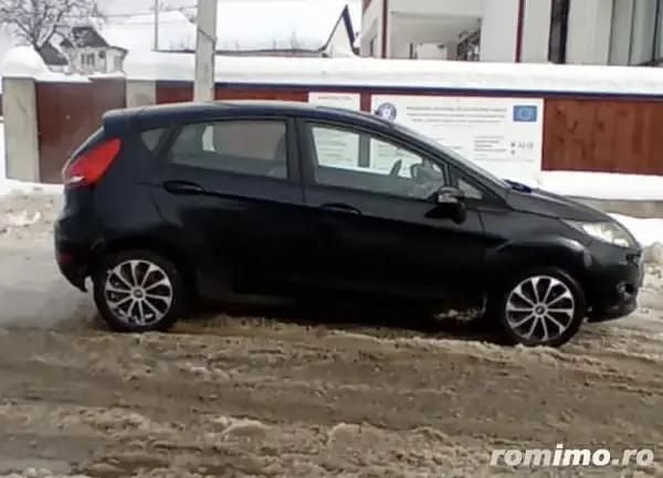 Second-hand Ford Fiesta 70 CP (51 kW) 2010 Negru Berlinǎ