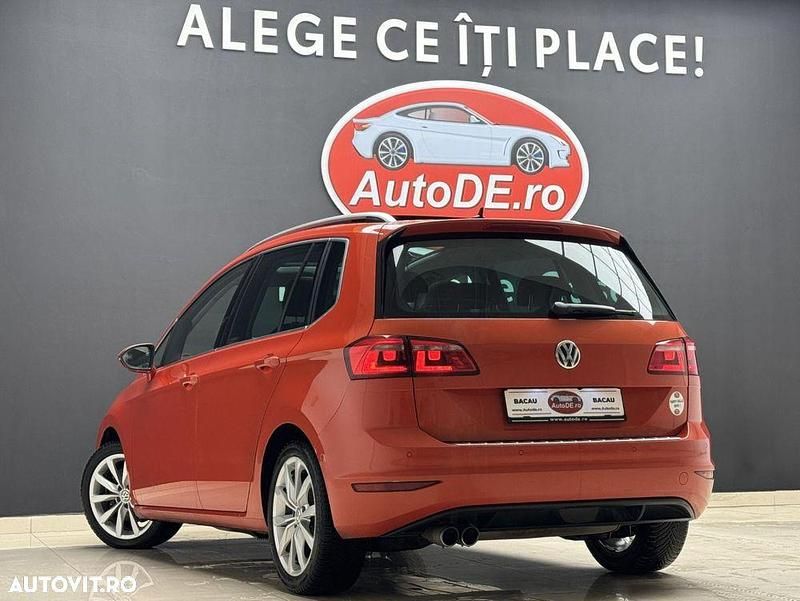 Second-hand VW Golf Sportsvan 150 CP (110 kW) 2014 Culoareportocaliu Monovolum