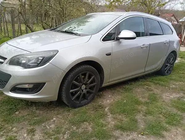 Second-hand Opel Astra 136 CP (100 kW) 2014 Gri Break
