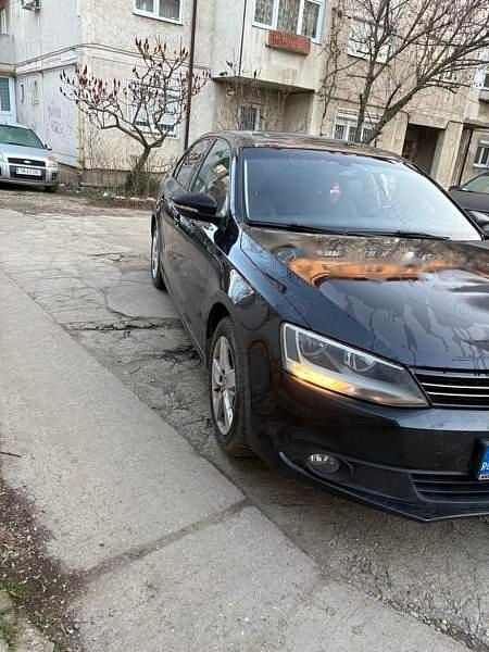 Second-hand VW Jetta 105 CP (77 kW) 2012 Negru Berlinǎ
