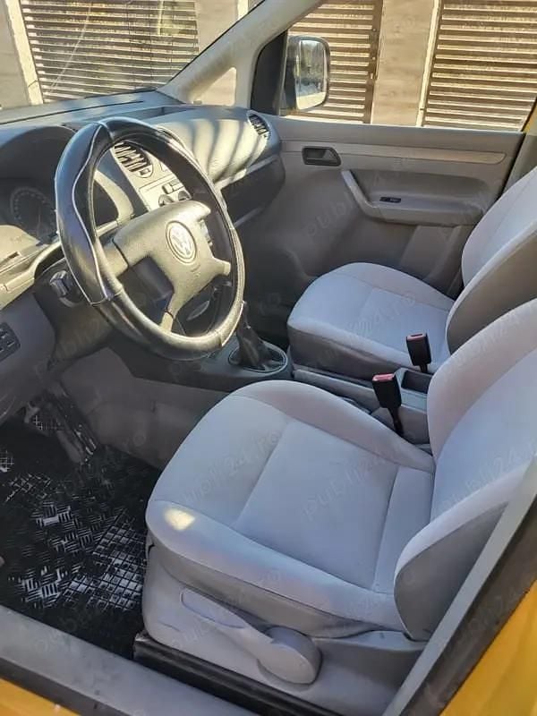 Second-hand VW Caddy 69 CP (50 kW) 2006 Galben Monovolum