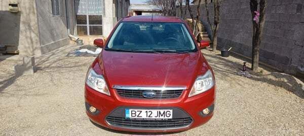Portocaliu Utilizat 2008 Ford Focus Hatchback | 3.500 EUR (Puțin scump) - Imagine 1/4