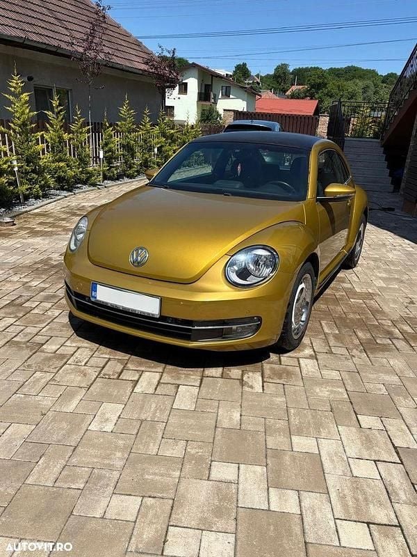 Second-hand VW Beetle 160 CP (117 kW) 2012 Culoaregalbeuriu Hatchback