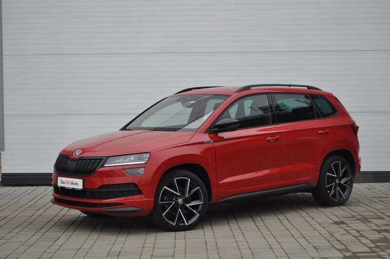Rosu deschis metalic perleffect Utilizat 2021 Skoda Karoq SportLine SUV | 26.537 EUR (Preț OK) - Imagine 1/4