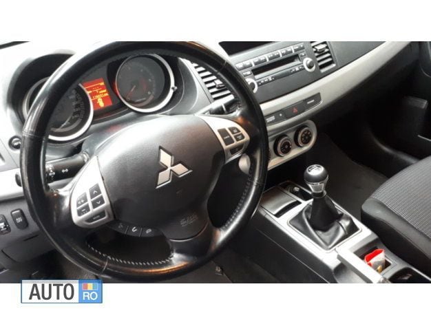 Second-hand Mitsubishi Lancer 140 CP (102 kW) 2008 Argintiu Berlinǎ