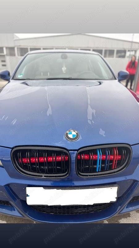 Second-hand BMW 320 177 CP (130 kW) 2009 Albastru Berlinǎ