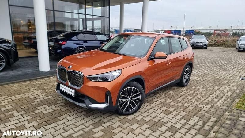 Culoareportocaliu Second-hand 2025 BMW iX1 SUV | 44.529 EUR - Imagine 1/4