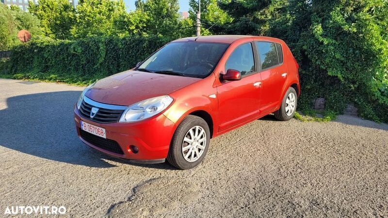 Rosu Utilizat 2009 Dacia Sandero Ambiance Hatchback | 1.999 EUR (Preț bun) - Imagine 1/4