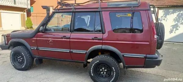 Rosu Utilizat 2000 Land Rover Discovery 2 SUV | 7.450 EUR - Imagine 1/4