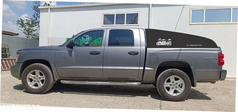Gri Utilizat 2011 Dodge Dakota SUV | 11.500 EUR - Imagine 1/4