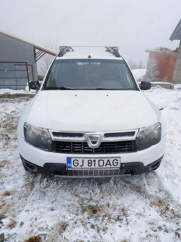 Alb Utilizat 2012 Dacia Duster SUV | 4.990 EUR (Preț OK) - Imagine 1/4