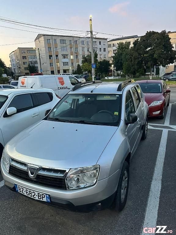 Argintiu Utilizat 2012 Dacia Duster SUV | 5.950 EUR (Preț OK) - Imagine 1/4