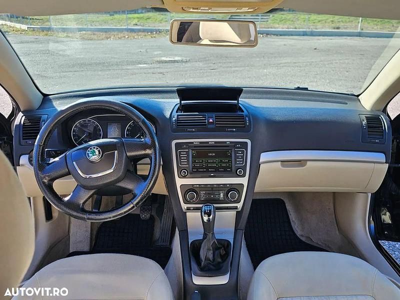 Culoarenegru Utilizat 2009 Skoda Octavia Business Line Berlinǎ | 4.400 EUR (Puțin scump) - Imagine 1/4