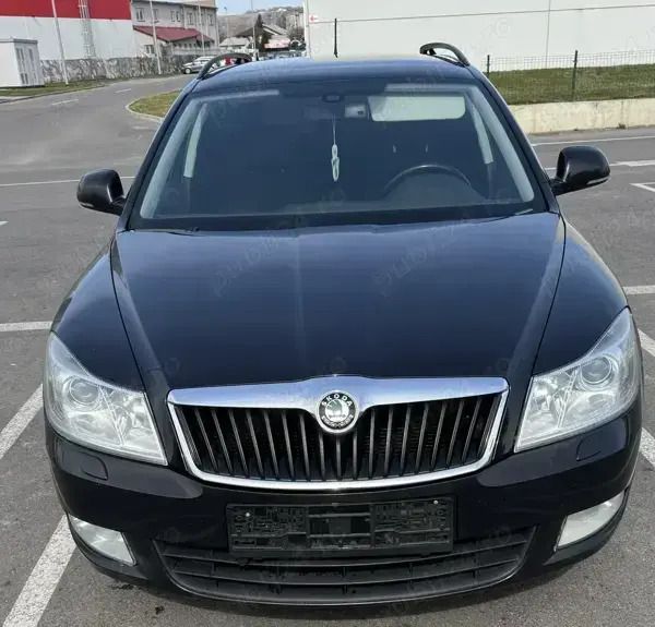Negru Utilizat 2013 Skoda Octavia Break | 5.800 EUR - Imagine 1/4
