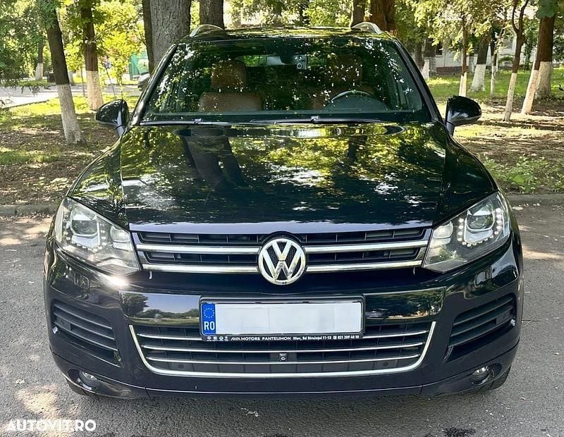 Culoarenegru Utilizat 2014 VW Touareg SUV | 15.200 EUR (Super Preț) - Imagine 1/4