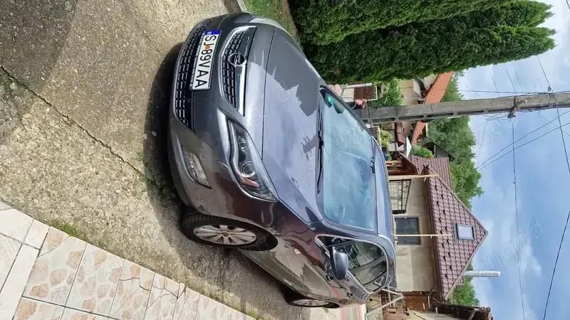 Gri Utilizat 2011 Opel Astra Break | 3.800 EUR (Preț OK) - Imagine 1/4
