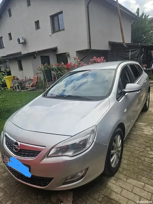 Second-hand Opel Astra Sport 110 CP (80 kW) 2011 Gri Hatchback