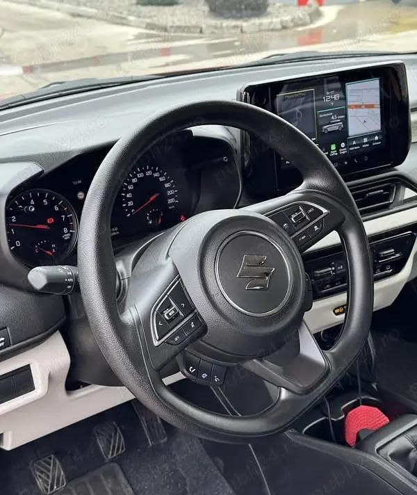 Second-hand Suzuki Swift Cool 83 CP (61 kW) 2024 Portocaliu Hatchback