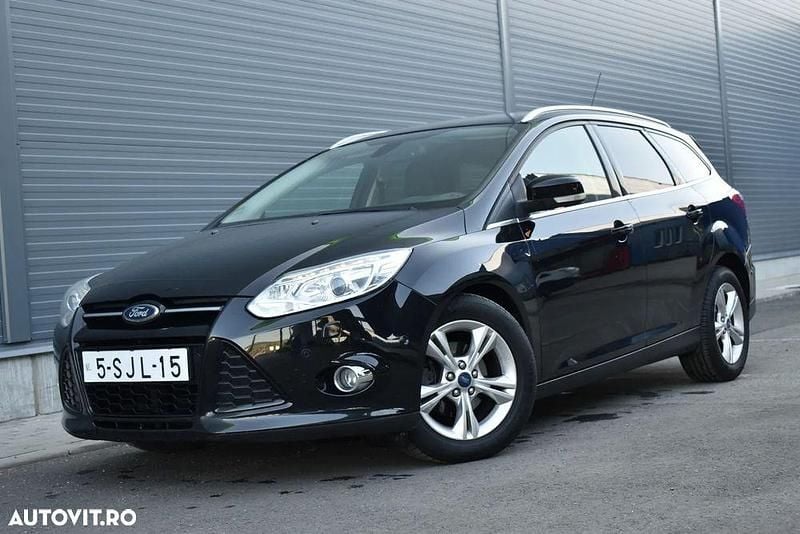 Culoarenegru Second-hand 2013 Ford Focus Titanium Break | 5.499 EUR (Preț OK) - Imagine 1/4