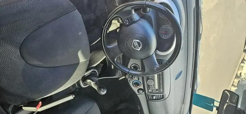 Second-hand Nissan Micra 65 CP (47 kW) 2010 Argintiu Berlinǎ