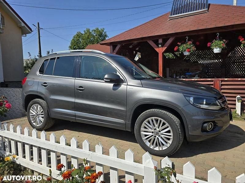 Culoaregri Utilizat 2014 VW Tiguan Cup SUV | 12.490 EUR (Preț bun) - Imagine 1/4