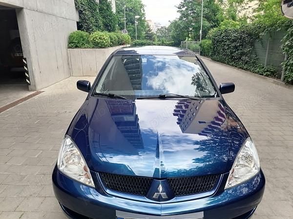 Second-hand Mitsubishi Lancer 98 CP (72 kW) 2009 Albastru Berlinǎ