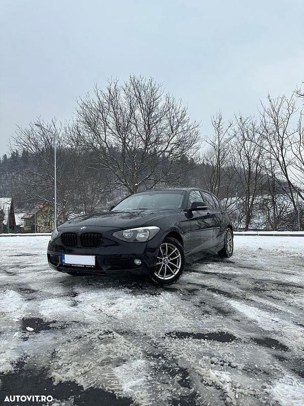 Culoarenegru Utilizat 2013 BMW 118 Urban Line Hatchback | 6.799 EUR (Preț OK) - Imagine 1/4