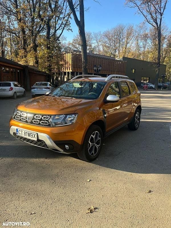 Culoareportocaliu Utilizat 2018 Dacia Duster Prestige SUV | 13.850 EUR (Preț OK) - Imagine 1/4