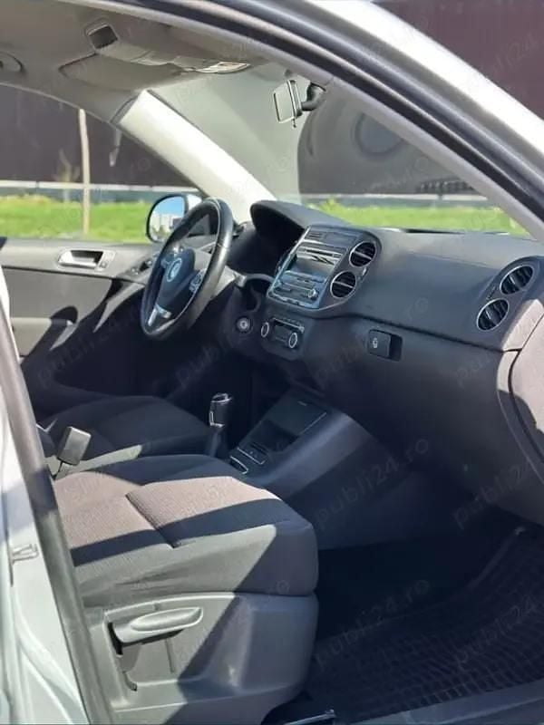 Second-hand VW Tiguan Sportline 163 CP (119 kW) 2011 Culoareargint SUV