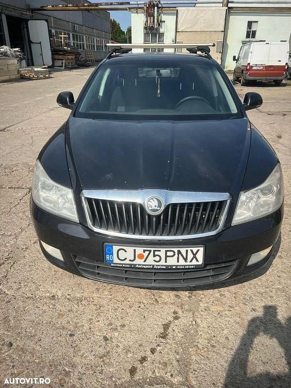 Culoarenegru Utilizat 2010 Skoda Octavia Ambiente Break | 2.500 EUR (Super Preț) - Imagine 1/4