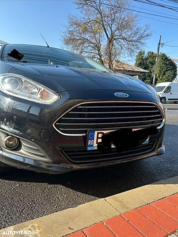 Culoarenegru Utilizat 2015 Ford Fiesta Coupe | 7.000 EUR (Puțin scump) - Imagine 1/4