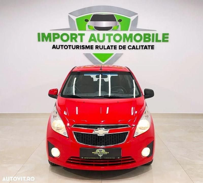 Second-hand Chevrolet Spark LS 68 CP (50 kW) 2011 Rosu Hatchback