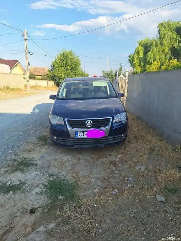Albastru Utilizat 2009 VW Touran Monovolum | 3.500 EUR (Preț bun) - Imagine 1/4