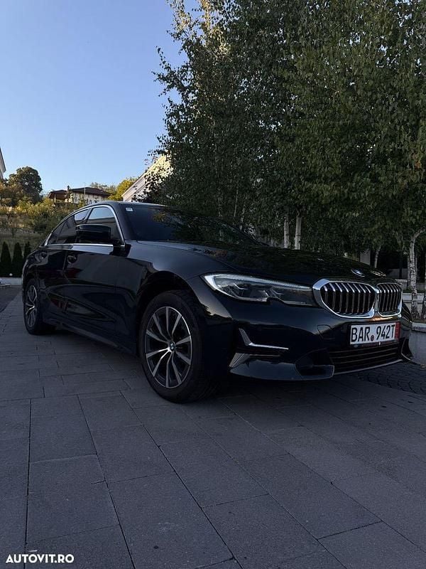 Culoarenegru Utilizat 2022 BMW 318 Luxury Line Berlinǎ | 23.500 EUR (Preț bun) - Imagine 1/4