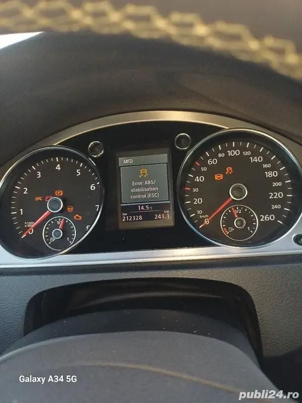 Second-hand VW Passat 140 CP (102 kW) 2012 Negru Hatchback