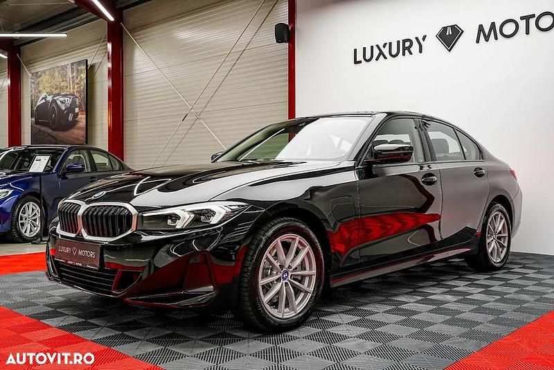 Culoarenegru Utilizat 2022 BMW 320e Sport Line Berlinǎ | 34.485 EUR (Preț OK) - Imagine 1/4