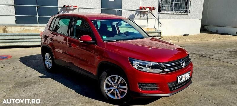 Rosu Utilizat 2014 VW Tiguan LOUNGE SUV | 9.999 EUR (Preț OK) - Imagine 1/4