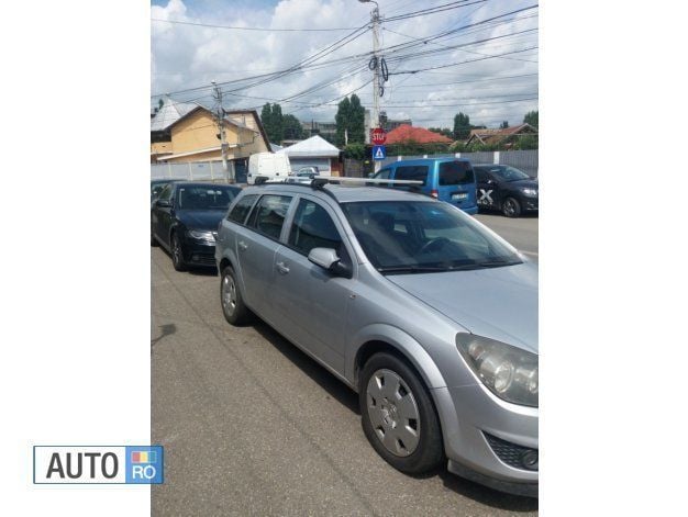 Second-hand Opel Astra 110 CP (80 kW) 2011 Argintiu Break