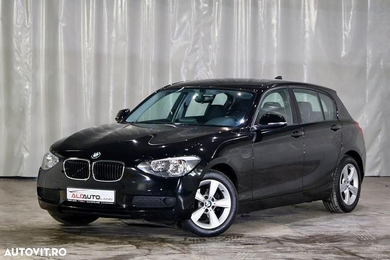 Culoarenegru Utilizat 2012 BMW 116 Comfort Edition Hatchback | 7.799 EUR (Preț OK) - Imagine 1/4