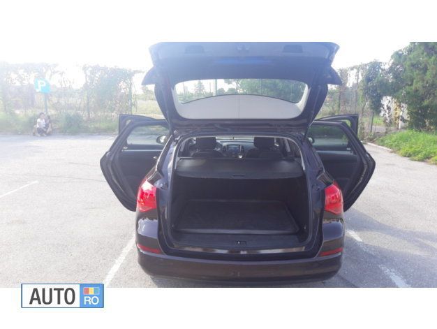 Second-hand Opel Astra 110 CP (80 kW) 2012 Maro Break